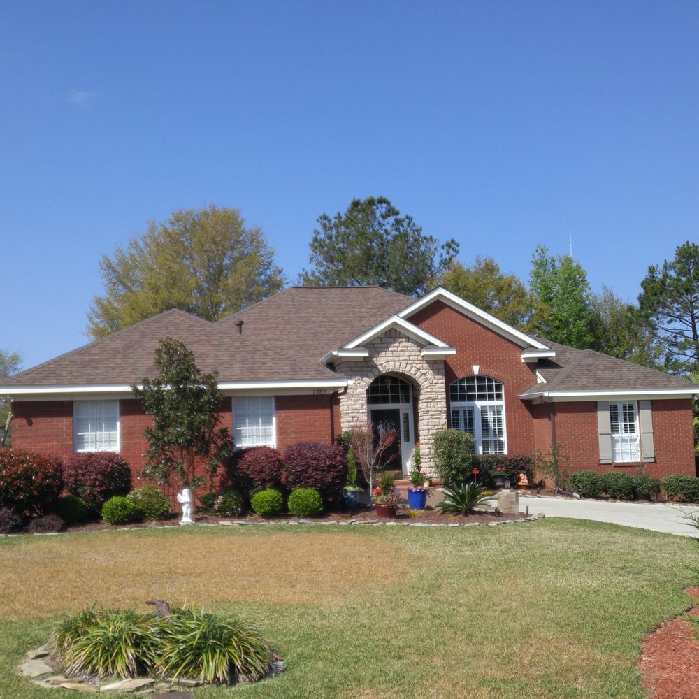 Slide of Tadlock Roofing