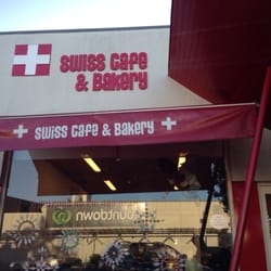 Swiss Bakery Patisserie & Cafe - Coffee with a little shortbread heart is a good start to the day
