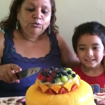 Diamond Bakery - Mother and nephew, cutting the Mango cake. DIAMOND BAKERY - Bakeries Near Me - Monterey Park, California