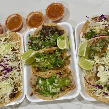 Los Tres Compadres - Left: Fish tacos no pico.  Middle: Pollo, Carnitas, Cabeza tacos.  Right: Regular fish tacos - Mexican Near Me - Fallbrook, California