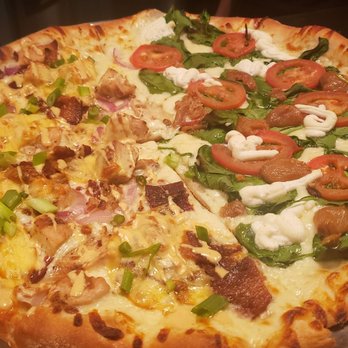 Pies & Pints - Chicken Gouda (Left) & White Pie with tomato and spinach (Right) - Pizza Near Me - Charleston, West Virginia