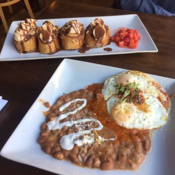 Black Sheep Cafe - French toast with peanut butter, Nutella, bananas and peanuts with strawberries on the side and Huevos Rancheros. - New American Near Me - Provo, Utah