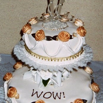 Cake World - The wedding cake I had Manuel make me in 2005. The WOW was for the fact that my husband & I met in a way we would've never imagine meeting - Cupcakes Near Me - Las Vegas, Nevada