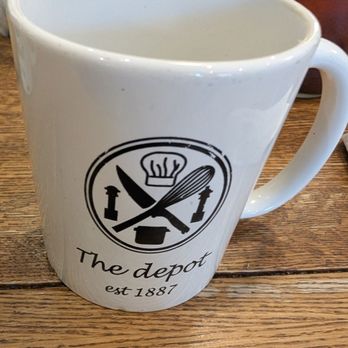 The Depot - A commemorative coffee cup I bought from this restaurant that was a converted train station that had its beginnings in the 1880s - Breakfast & Brunch Near Me - Leavenworth, Kansas