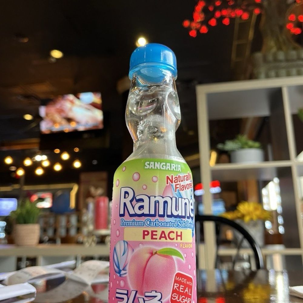 Izzi Korean Kitchen - Ramune peach drink - Korean Near Me - Orlando, Florida Izzi Korean Kitchen - Ramune peach drink - Korean Near Me - Orlando, Florida