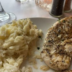 The Bistro - Tuscany Chicken with roasted garlic smashed (3 of these pieces of chicken) Lots of food served!