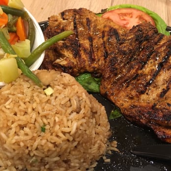Super Chicken - Pollo Parrillero with fried rice and steamed veggies. - Latin American Near Me - Vienna, Virginia Super Chicken - Pollo Parrillero with fried rice and steamed veggies. - Latin American Near Me - Vienna, Virginia