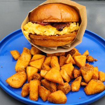 Burnt Crumbs - Bacon egg and cheddar breakfast sandwich on a brioche bun. Best I've ever had! - New American Near Me - Irvine, California