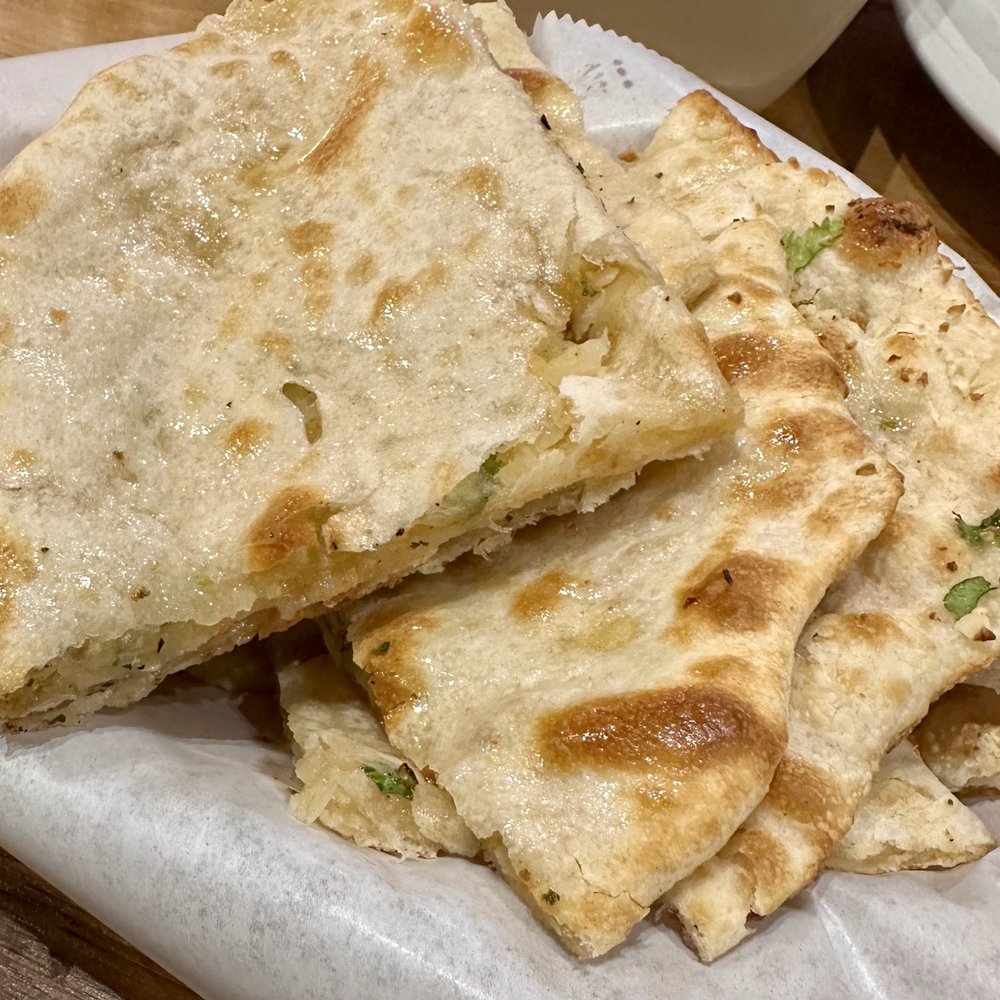 Naan, garlic naan & aloo naan basket Naan, garlic naan & aloo naan basket