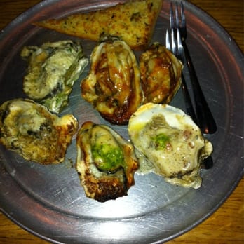 Angelo’s Taverna - Chipotle Bourbon Butter, Original & Bacon and Gorgonzola Chargrilled Oysters!! SO YUMMY! - Italian Near Me - Denver, Colorado Angelo’s Taverna - Chipotle Bourbon Butter, Original & Bacon and Gorgonzola Chargrilled Oysters!! SO YUMMY! - Italian Near Me - Denver, Colorado