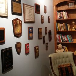 Garrett Hypnosis & Wellness Center - One of 2 reception areas for Larry Garrett & his many many awards.  I learned the "Oscar" on the shelf is the highest Hypnosis award.