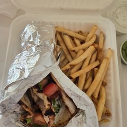 Chirping Chicken - Chicken gyro with fries. $9.00 AWESOME! Make sure you ask for green sauce !