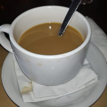 Bistro St Germain - This is how my coffee was served. Not aure why the napkin was underneath the cup but ok... - French Near Me - Seal Beach, California Bistro St Germain - This is how my coffee was served. Not aure why the napkin was underneath the cup but ok... - French Near Me - Seal Beach, California