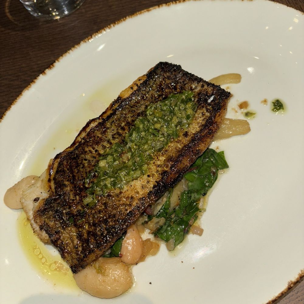 Rye Street Tavern - Wild Chesapeake Bay Rockfish (GF) - Bars Near Me - Baltimore, Maryland Rye Street Tavern - Wild Chesapeake Bay Rockfish (GF) - Bars Near Me - Baltimore, Maryland