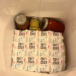 Opened box upon arrival with dressing and sauces.