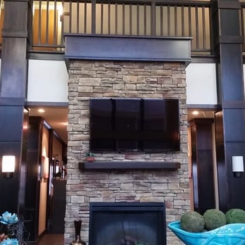 Staybridge Suites Minot - Double sided fake fireplace. - Hotels Near Me - Minot, North Dakota Staybridge Suites Minot - Double sided fake fireplace. - Hotels Near Me - Minot, North Dakota