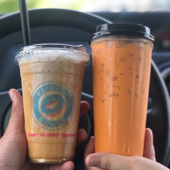 Painted Dough - Left - Ice Caramel Macchiato Frappe, Right - Thai Tea - Donuts Near Me - Chino, California Painted Dough - Left - Ice Caramel Macchiato Frappe, Right - Thai Tea - Donuts Near Me - Chino, California