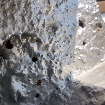 McPartlon Roofing - Holes from birds pecking - Roofing Near Me - Santa Fe, New Mexico