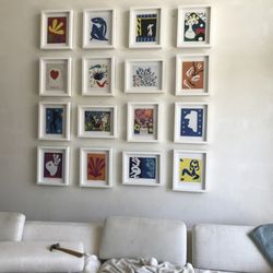 Eugene's Handyman Services - Large gallery with landscape and portrait pieces.