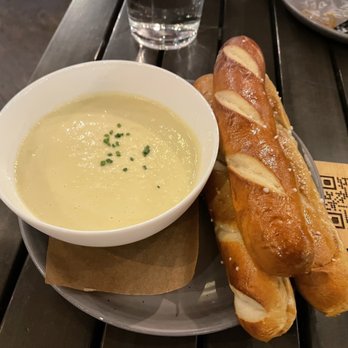 Benchmark - Artichoke fondue with Fred baked pretzel bread. - New American Near Me - Santa Ana, California