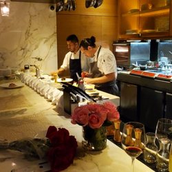 Chefs table sitting at the bar