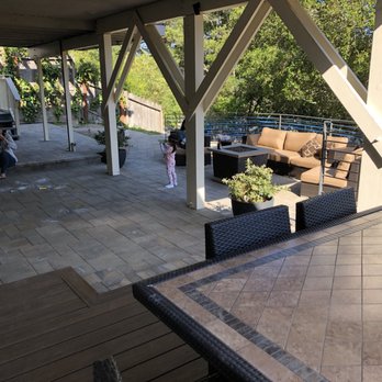 Hill Construction Company - a patio with a table and chairs - Landscaping Near Me - San Carlos, California Hill Construction Company - a patio with a table and chairs - Landscaping Near Me - San Carlos, California