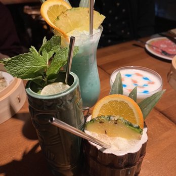 Wusong Road - Blue Hawaiian, Aku Aku, Painkiller, Voodoo Grog (CW from top) - Tiki Bars Near Me - Cambridge, Massachusetts Wusong Road - Blue Hawaiian, Aku Aku, Painkiller, Voodoo Grog (CW from top) - Tiki Bars Near Me - Cambridge, Massachusetts