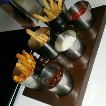Bourbon Steak - Complimentary duck fat fries with sauce accompaniments. My fave was the pickle one. - Steakhouses Near Me - Glendale, California Bourbon Steak - Complimentary duck fat fries with sauce accompaniments. My fave was the pickle one. - Steakhouses Near Me - Glendale, California