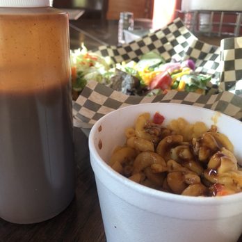 Dawg House - Side of smoked mac and cheese topped with homemade bbq sauce. Was delicious. (My hungry belly already took a few bites before the photo) - Barbeque Near Me - Okanogan, Washington Dawg House - Side of smoked mac and cheese topped with homemade bbq sauce. Was delicious. (My hungry belly already took a few bites before the photo) - Barbeque Near Me - Okanogan, Washington