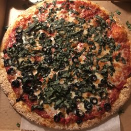 Pizza with olives and fresh basil Pizza with olives and fresh basil