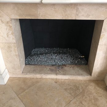 Blodgett's Cleaners - Clean fireplace with added fire glass - Chimney Sweeps Near Me Blodgett's Cleaners - Clean fireplace with added fire glass - Chimney Sweeps Near Me