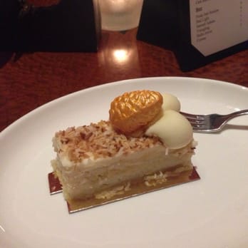 Bar Cocoa - Coconut cake filled with mostly coconut flakes. I didn't enjoy it. - Desserts Near Me - Charlotte, North Carolina