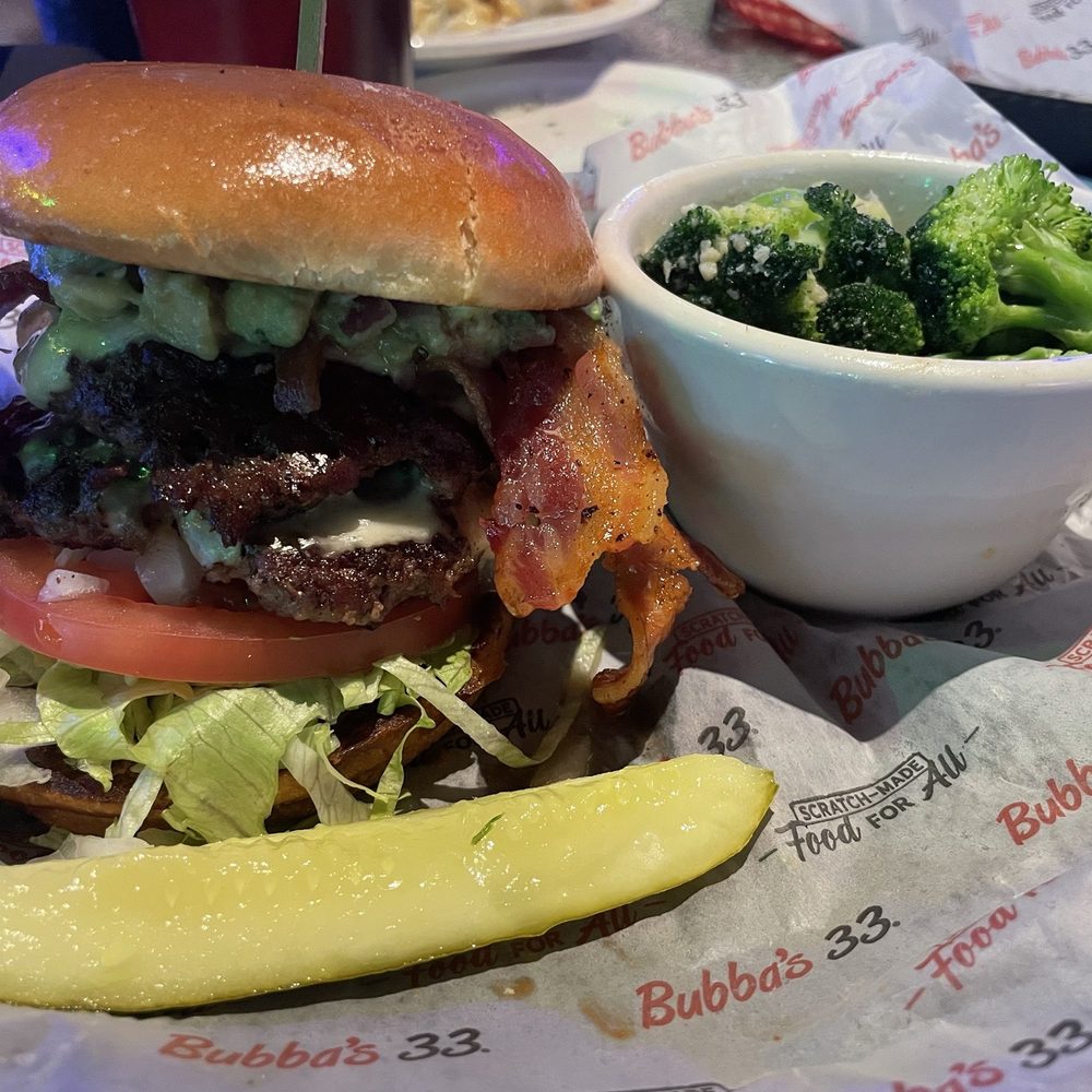 Bubba's 33 - Bacon Guacamole Burger with side of broccoli - Sports Bars Near Me - Louisville, Kentucky