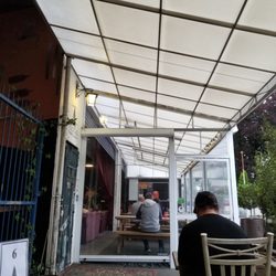 Volstead Trading Company - View while eating of the front door and outdoor covering