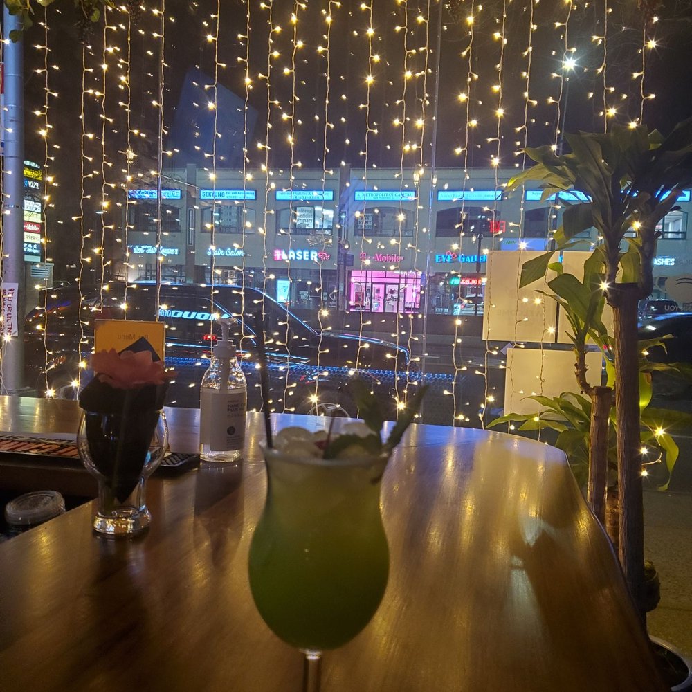 Firefly - I went here by myself!! The atmosphere is good and most likely employees and employer were good. Also food was so good. - Cocktail Bars Near Me - Flushing, New York