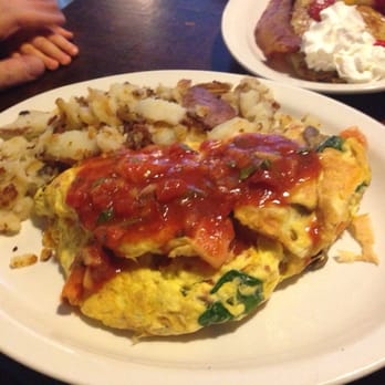 Rusty Pelican Cafe - Salsa smothered omelette with fried potatoes. - Desserts Near Me - Mill Creek, Washington Rusty Pelican Cafe - Salsa smothered omelette with fried potatoes. - Desserts Near Me - Mill Creek, Washington