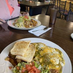 My wife had the SW Burrito in the background and I had the Spanish Omelette in the foreground   Our server " Mariah" was awesome