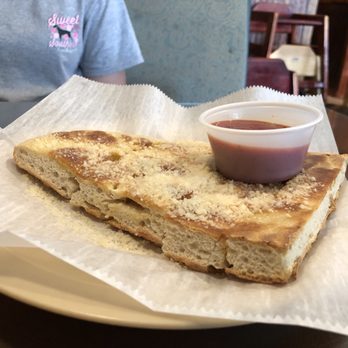 Melini Cucina - a half eaten sandwich on a plate - Italian Near Me - Mt Sterling, Kentucky Melini Cucina - a half eaten sandwich on a plate - Italian Near Me - Mt Sterling, Kentucky