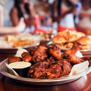 Hooters | Westminster - a plate of chicken wings and fries - American Near Me - Westminster, Colorado Hooters | Westminster - a plate of chicken wings and fries - American Near Me - Westminster, Colorado