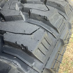 Vaden Nissan of Hinesville - You can see the chipping on the edge of my brand, new tires from where they cut the wheel too sharp, and it was rubbing it against the body.