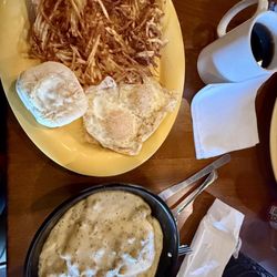 Mundy's Bar & Grill - The Large biscuits and sausage gravy was so filling and delicious.