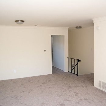 Brookwood at Islip - Hallway with Staircase - Apartments Near Me - Islip, New York