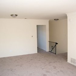 Brookwood at Islip - Hallway with Staircase