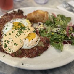 Perly's - The most delicious corned beef hash with hollandaise sauce and side salad.