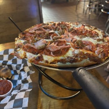 The Bird Bar & Grill - Meat lovers pizza - Bars Near Me - Mount Pleasant, Michigan The Bird Bar & Grill - Meat lovers pizza - Bars Near Me - Mount Pleasant, Michigan
