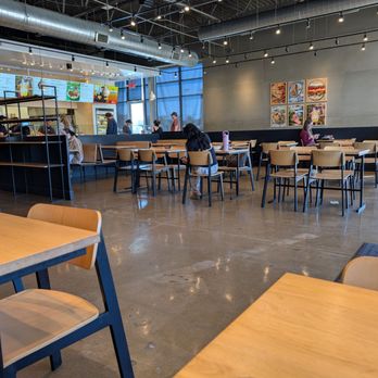 CAVA - Indoor dining area - Salad Near Me - Webster, Texas
