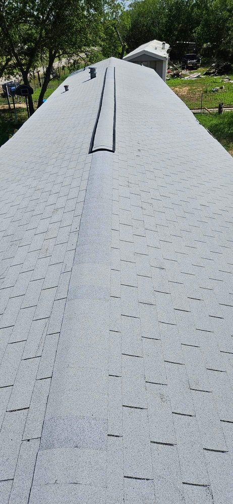 Slide of Roofers In San