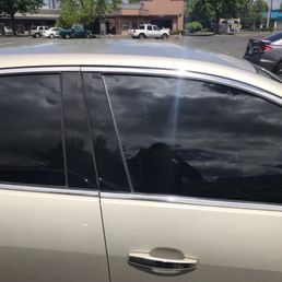5%  back and 15% front plus heat protection due to leather seats definitely worth the extra. Also got the strip on the windshield.