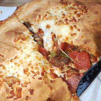 Seasons Pizza - Chicago stromboli with added banana peppers and salami - Italian Near Me - Stratford, New Jersey Seasons Pizza - Chicago stromboli with added banana peppers and salami - Italian Near Me - Stratford, New Jersey