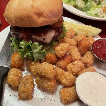 The Tollgate - Western Bacon Cheese burger. Tots were crispy on the outside and greasy on the inside. BBQ sauce was good. - American Near Me - Sandy, Oregon The Tollgate - Western Bacon Cheese burger. Tots were crispy on the outside and greasy on the inside. BBQ sauce was good. - American Near Me - Sandy, Oregon